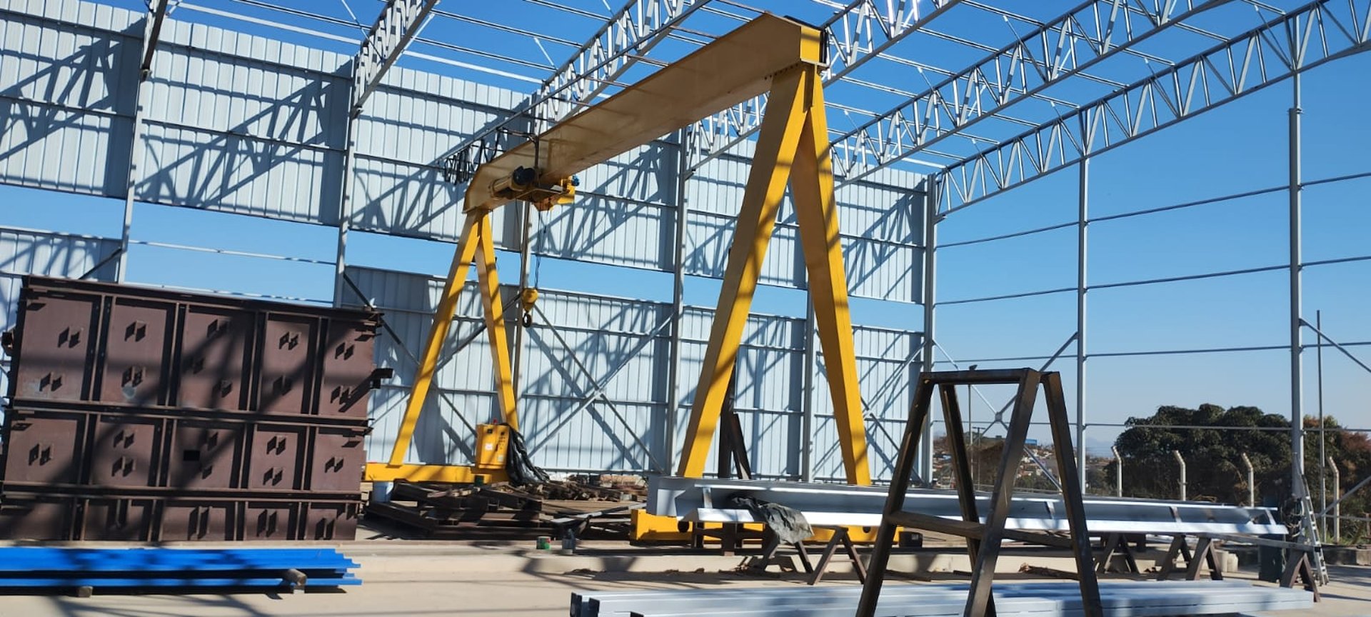 woman wearing yellow long-sleeved dress under white clouds and blue sky during daytime