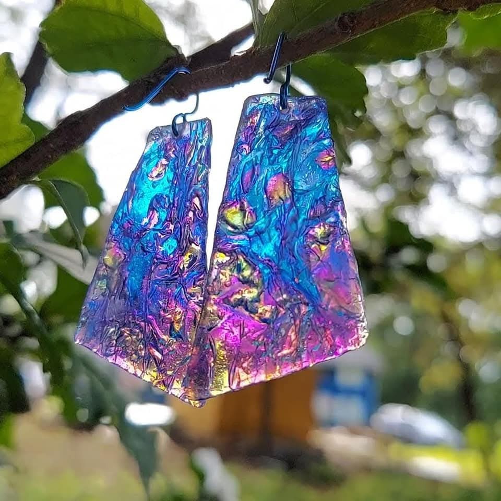woman wearing yellow long-sleeved dress under white clouds and blue sky during daytime