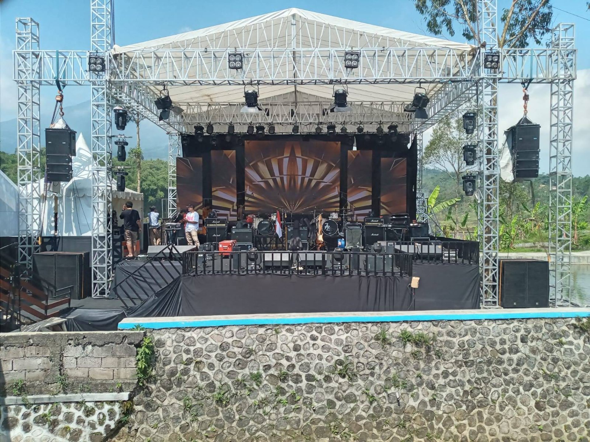 people gathering on concert field