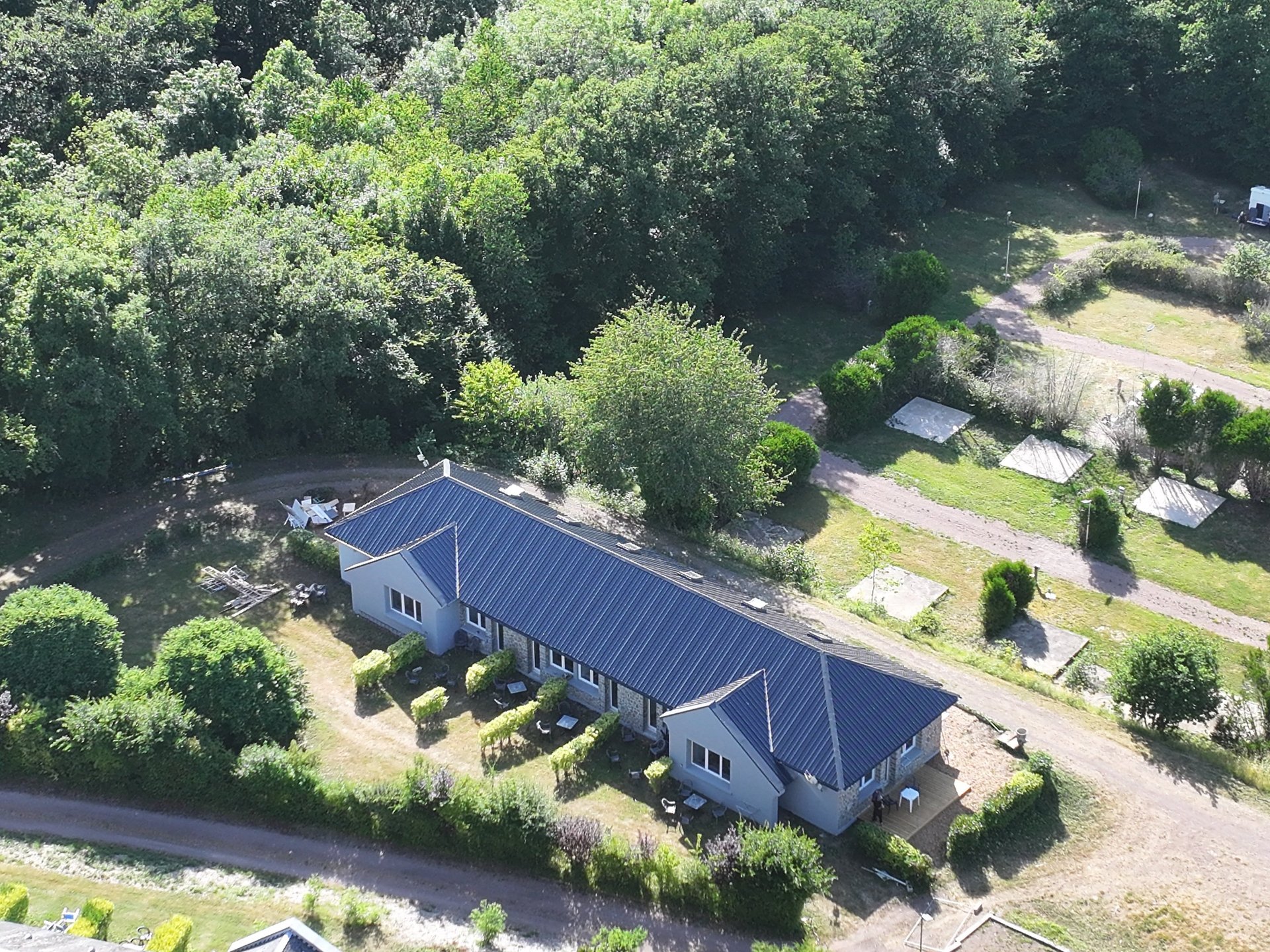 woman wearing yellow long-sleeved dress under white clouds and blue sky during daytime