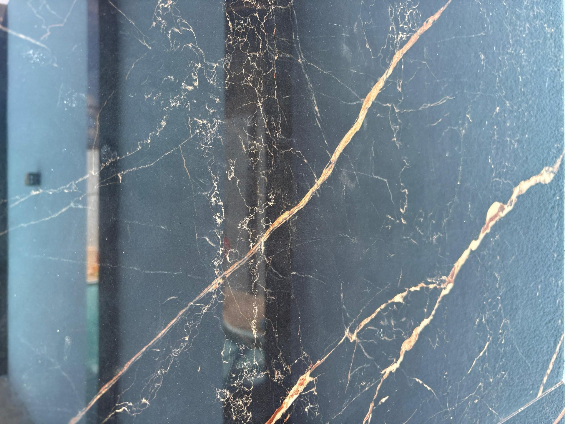 black and brown leather padded tub sofa