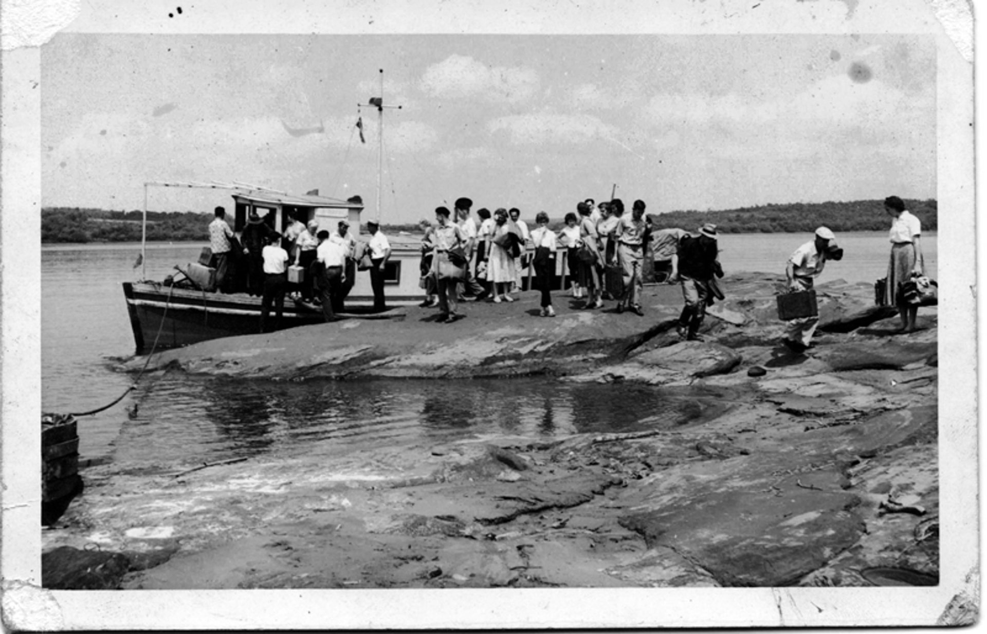 an abstract photo of a curved building with a blue sky in the background