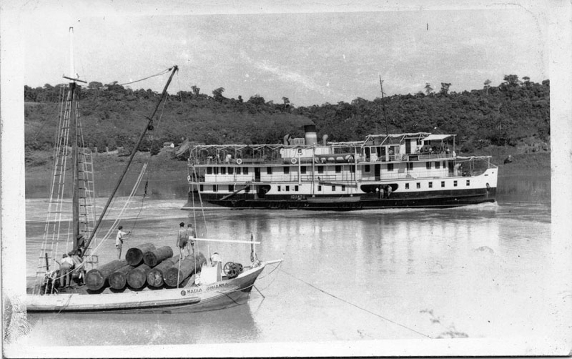 an abstract photo of a curved building with a blue sky in the background