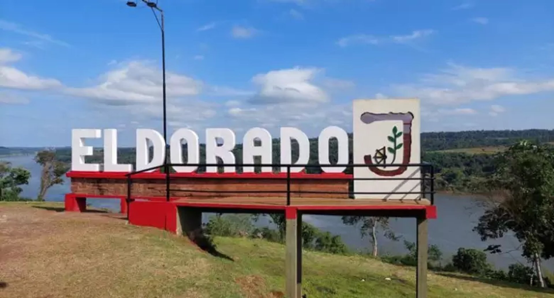 an abstract photo of a curved building with a blue sky in the background