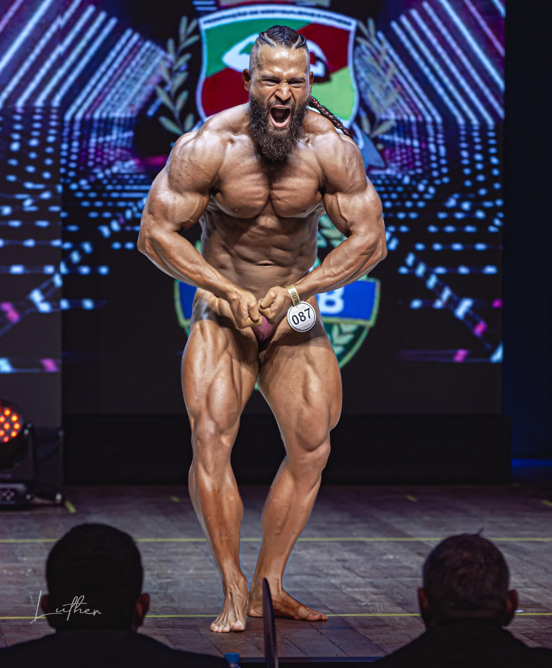 black and brown leather padded tub sofa
