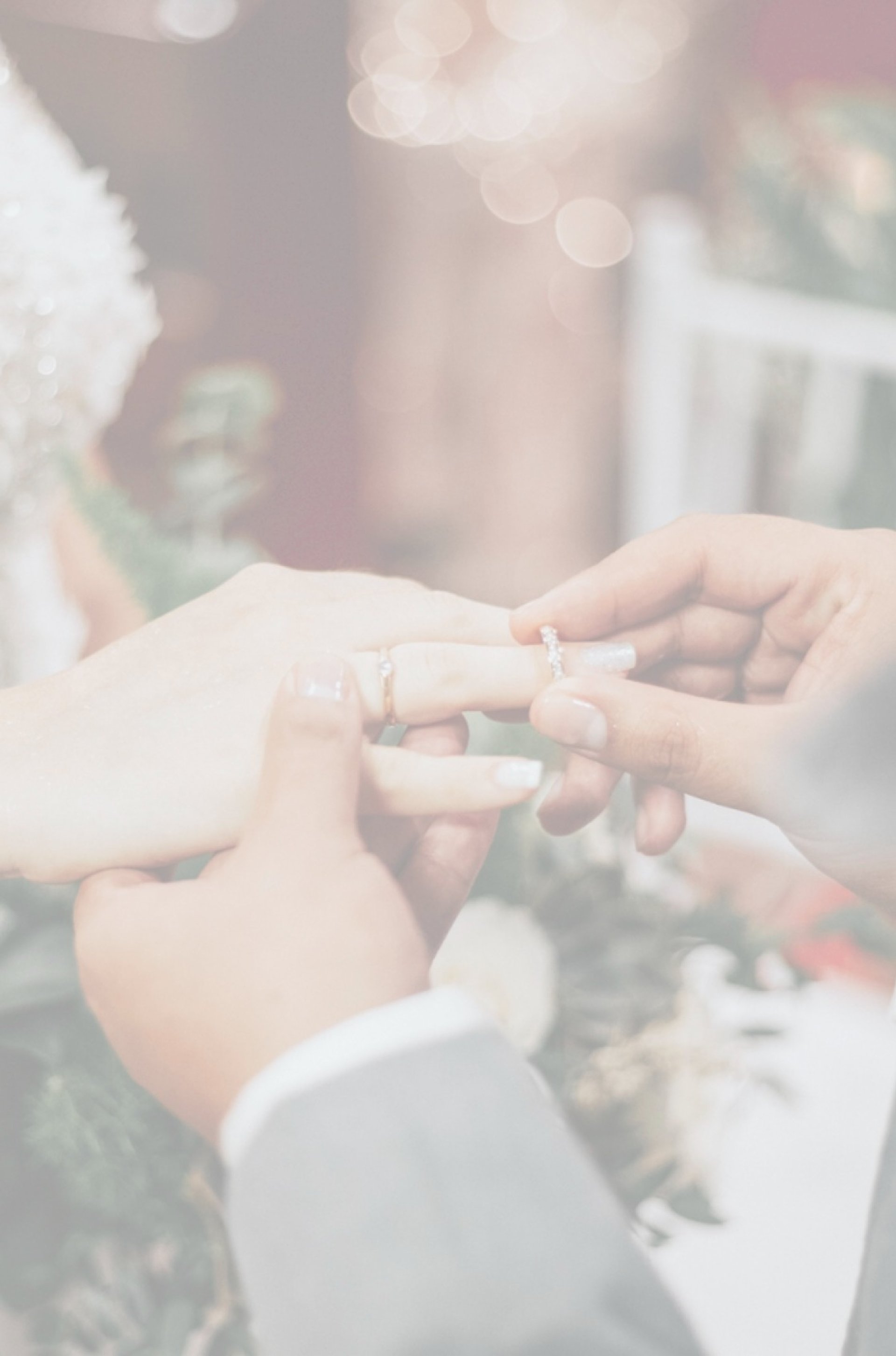 couple wearing silver-colored rings