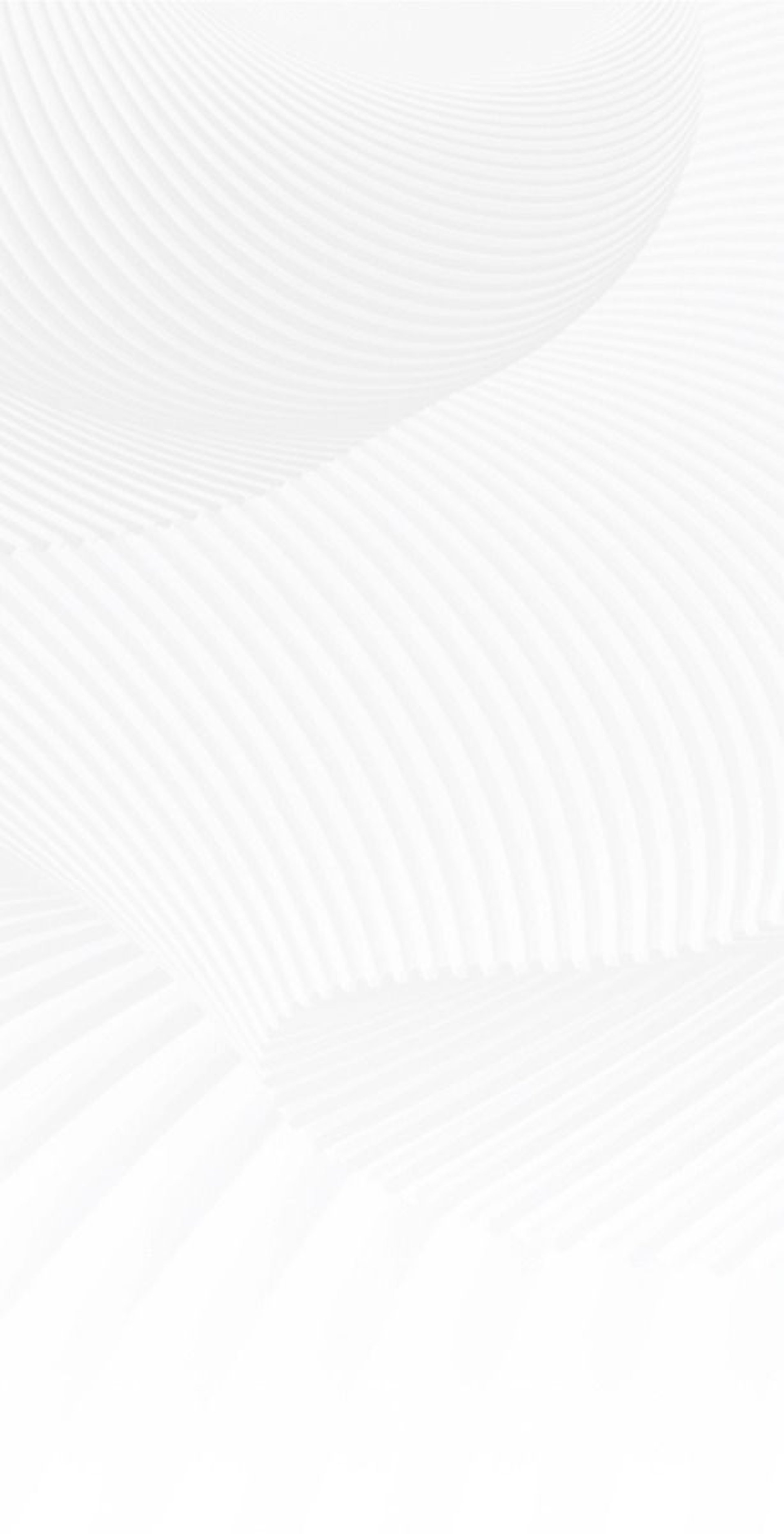 an abstract photo of a curved building with a blue sky in the background