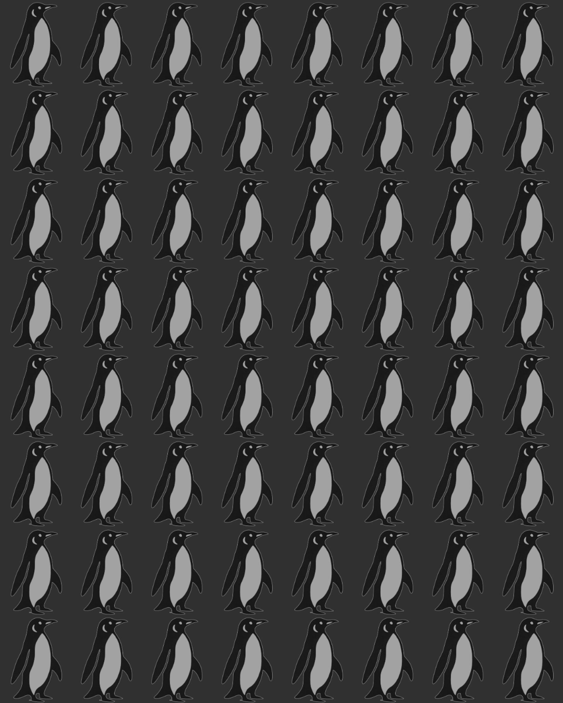 a man standing in front of a microphone on a stage