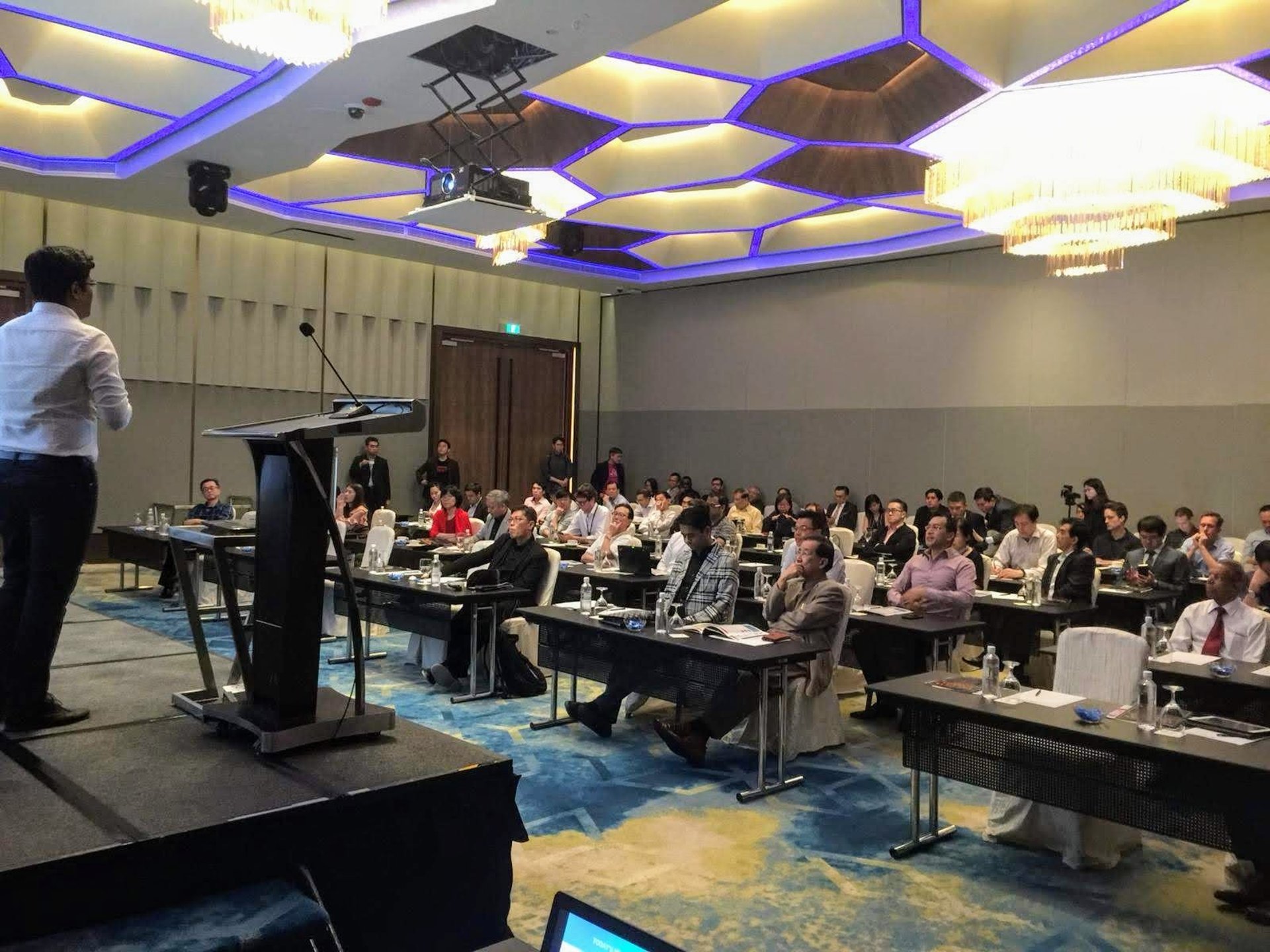 A group of business people sitting around a table