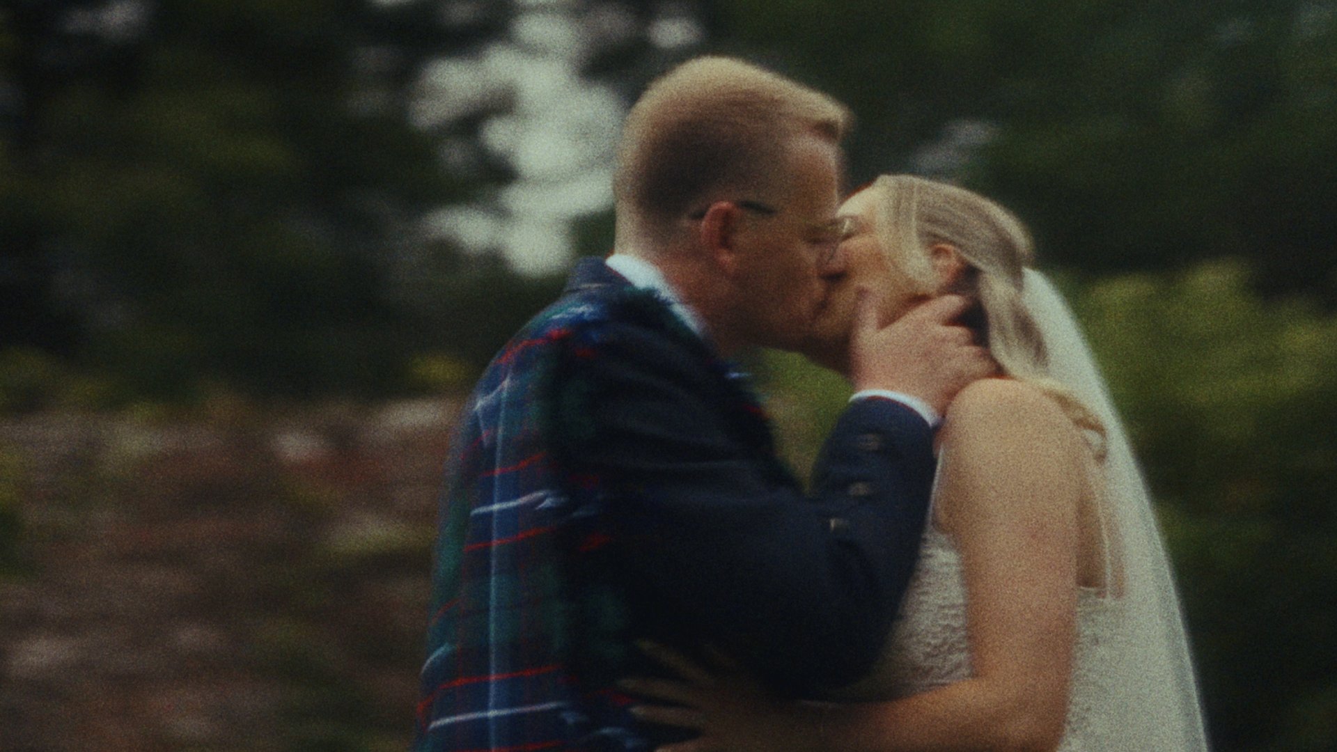 an abstract photo of a curved building with a blue sky in the background