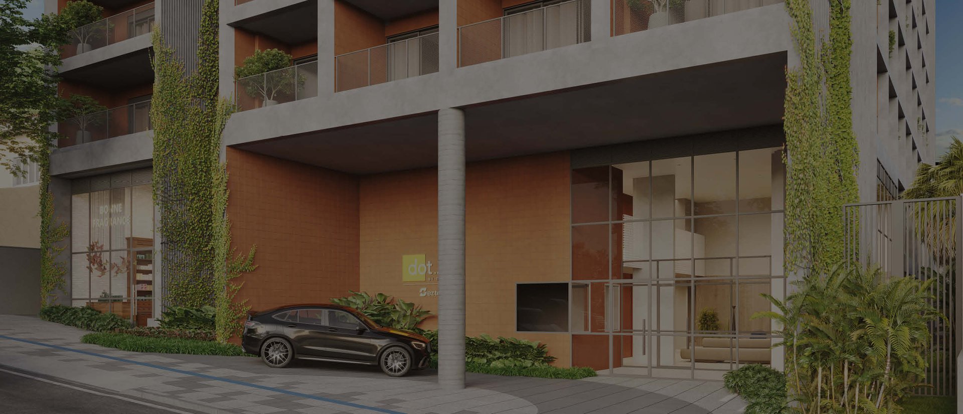 a woman sitting at a table writing on a piece of paper