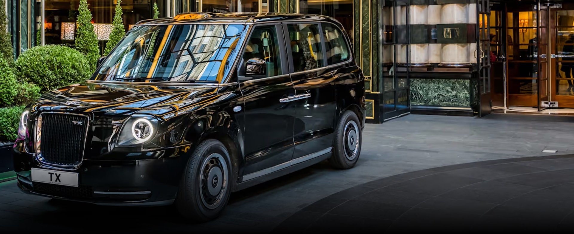black and brown leather padded tub sofa