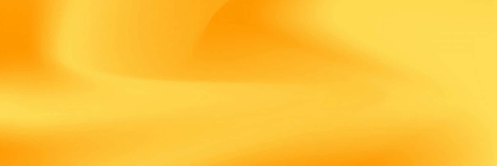 a yellow wall with a clock on it