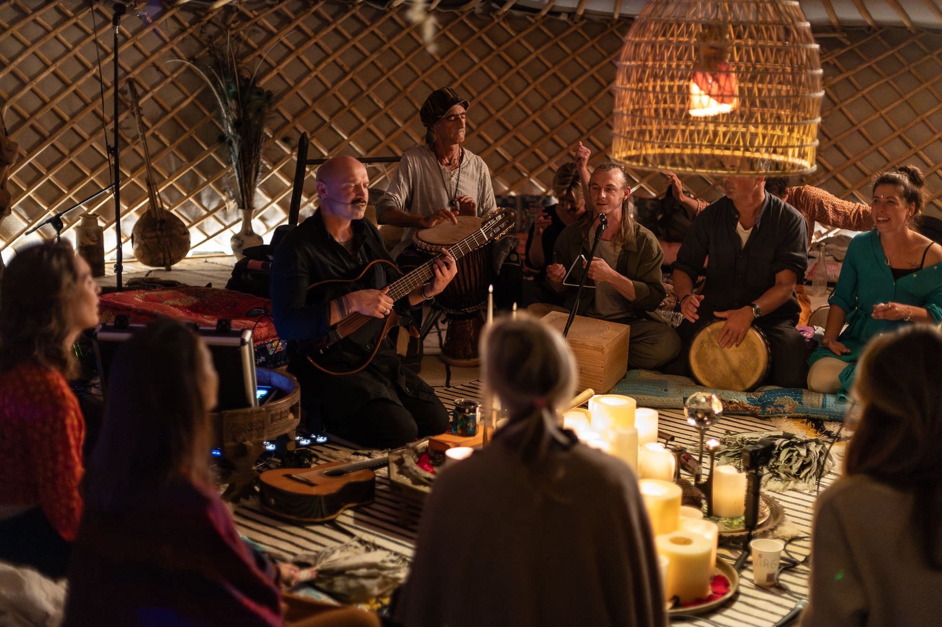 woman in white and brown dress standing on green grass during night time