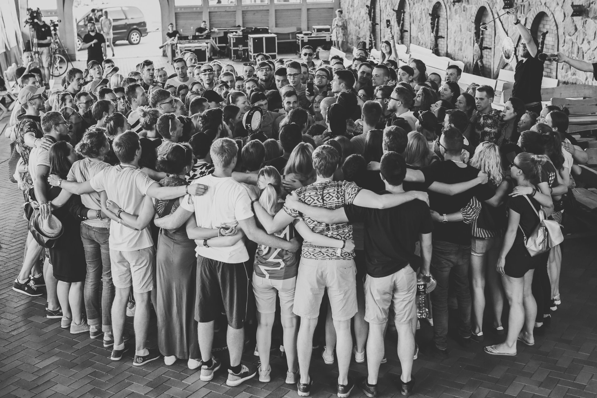 woman in white and brown dress standing on green grass during night time