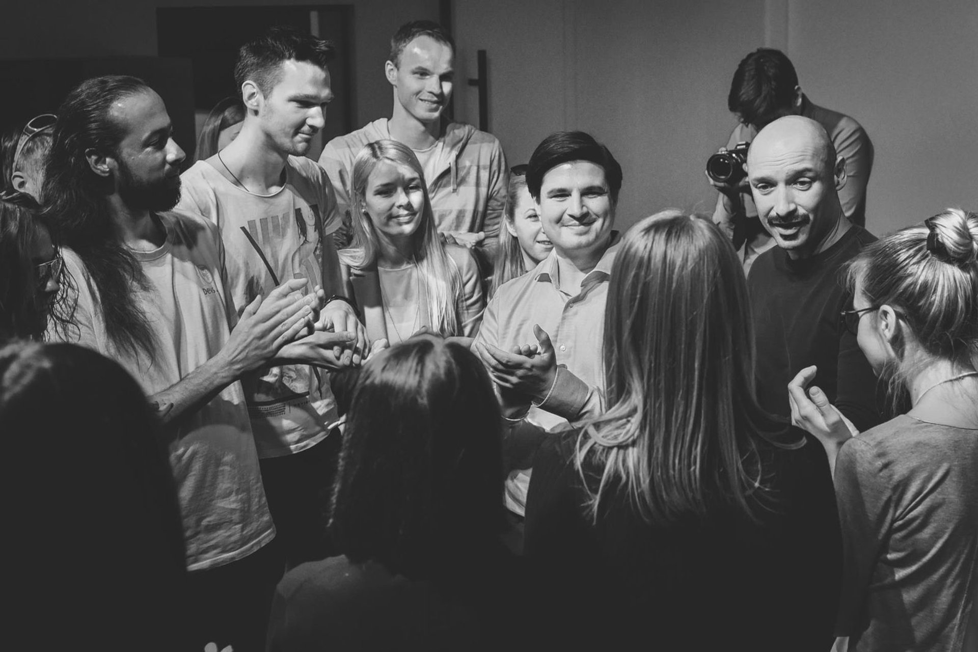 woman in white and brown dress standing on green grass during night time