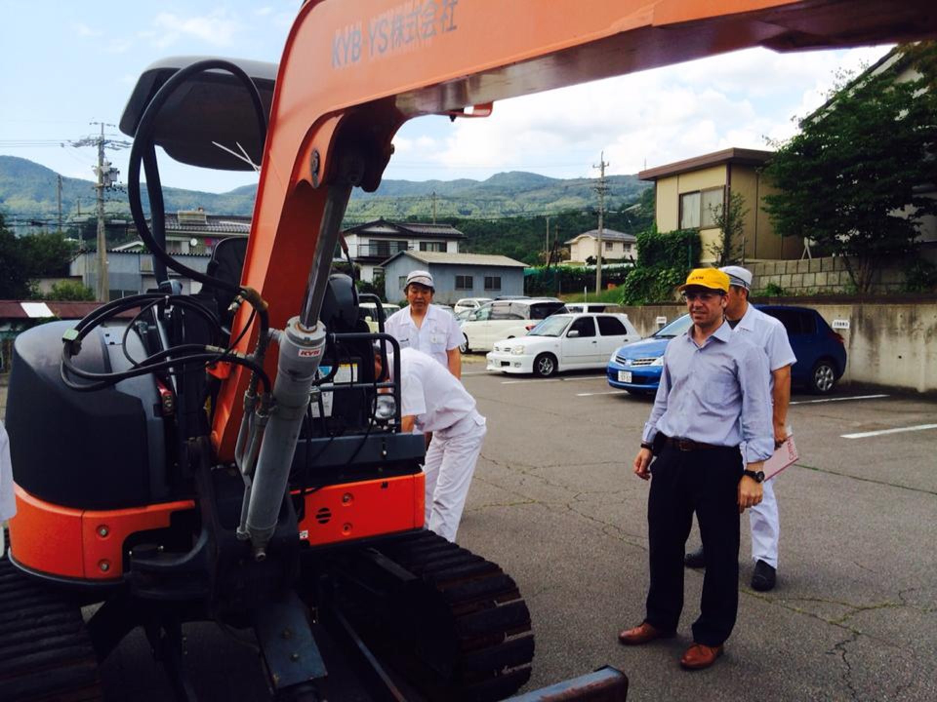 black and brown leather padded tub sofa