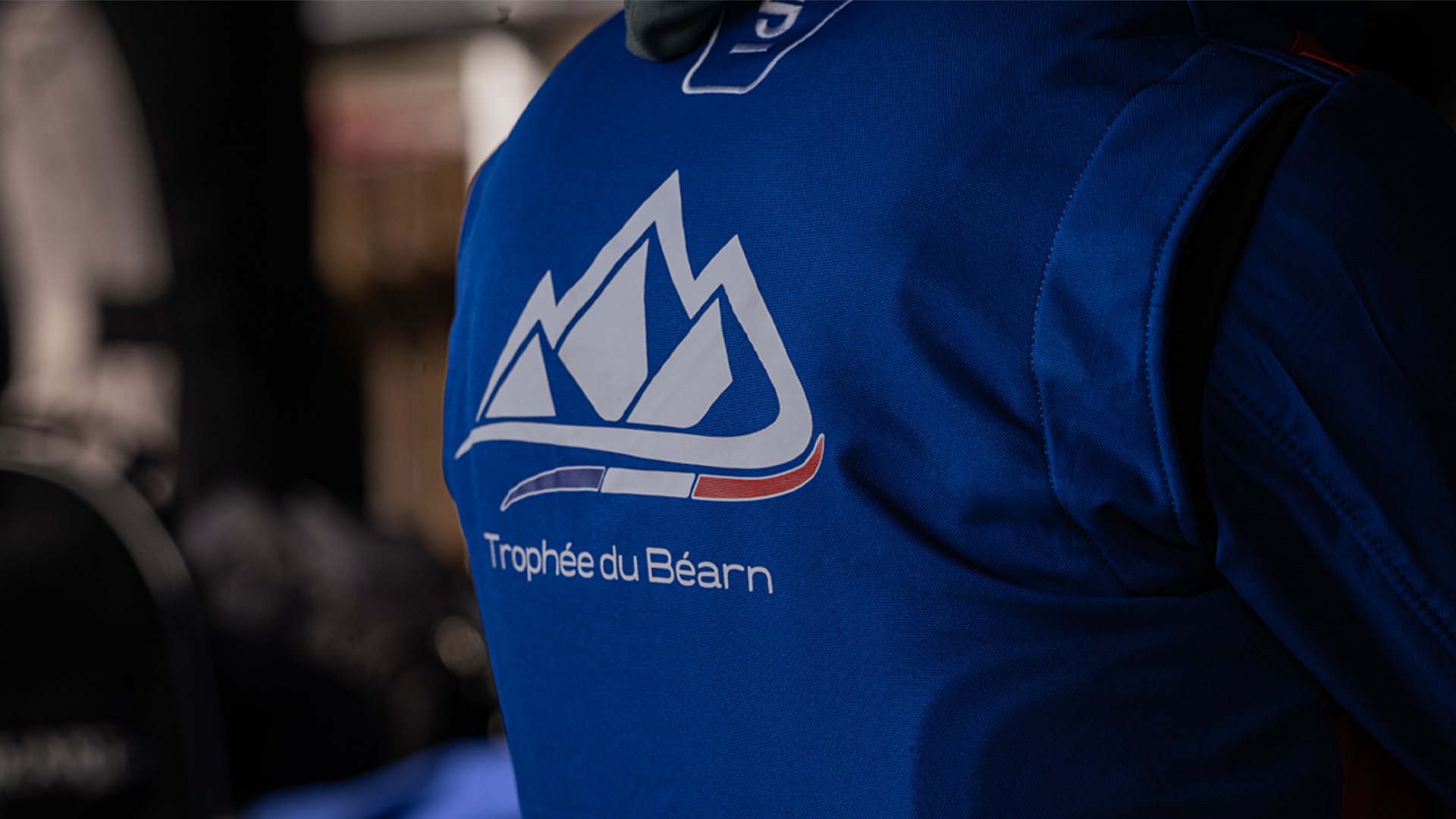 an abstract photo of a curved building with a blue sky in the background