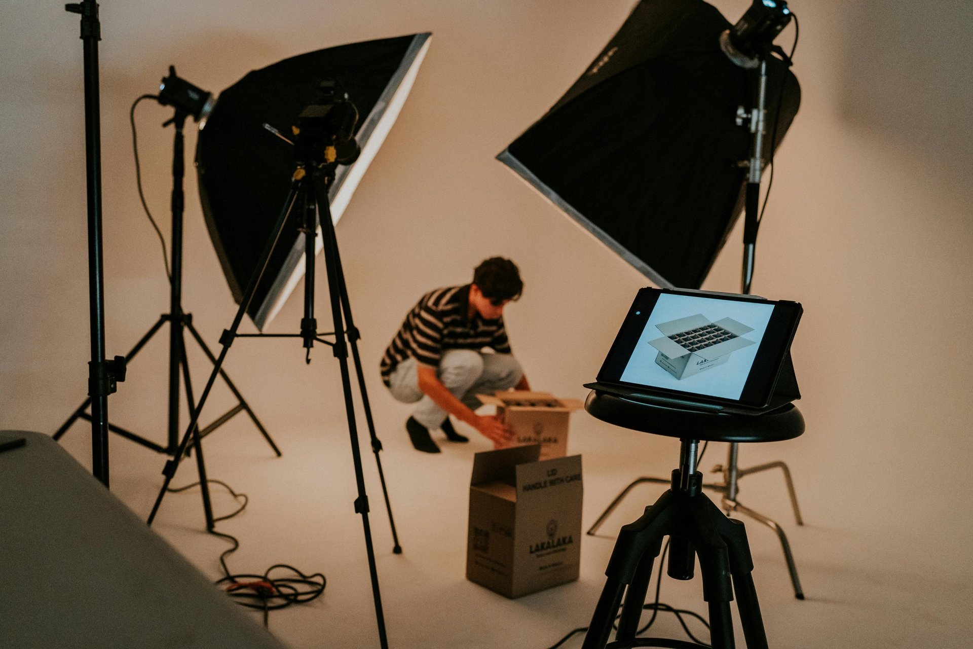 Three co-workers sitting together in the office with Surface laptop on the table