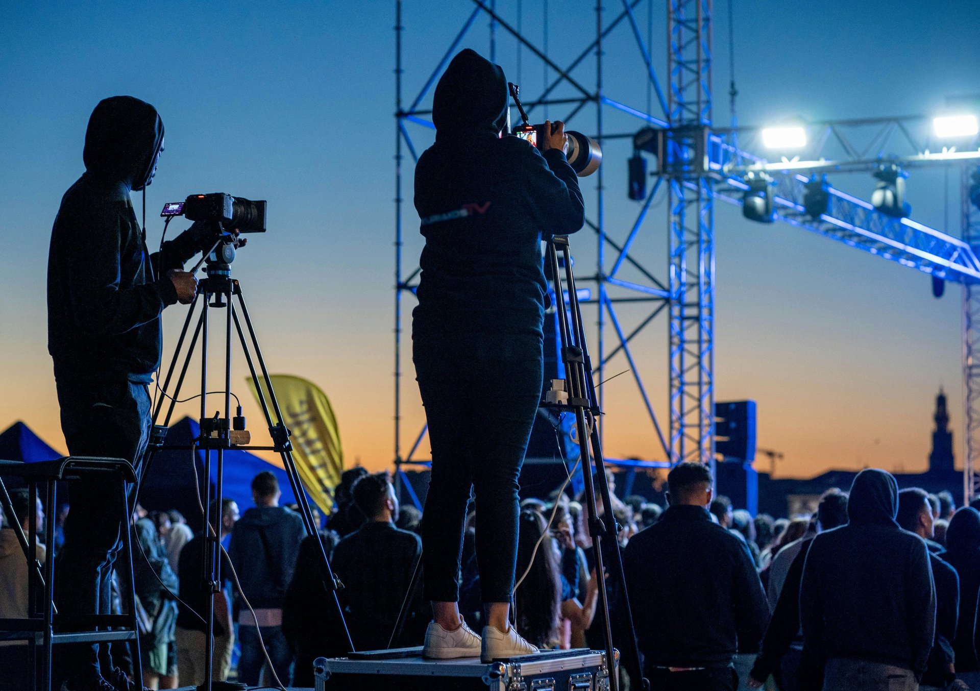 Three co-workers sitting together in the office with Surface laptop on the table