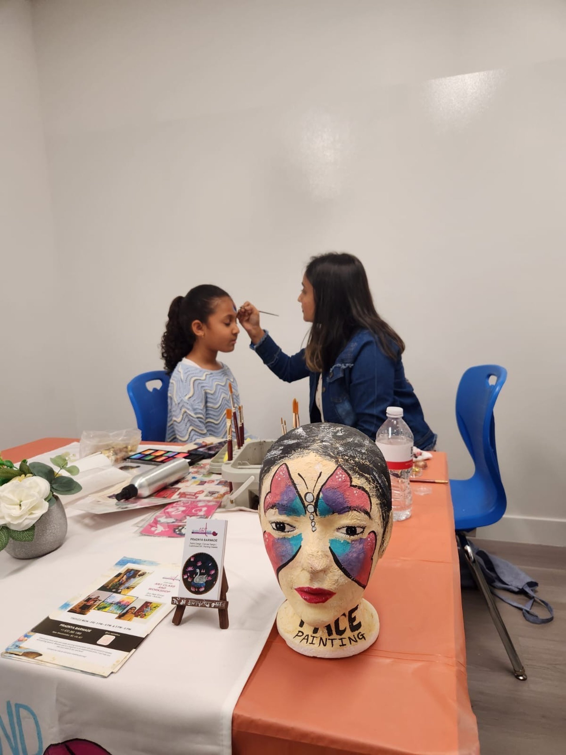 an abstract photo of a curved building with a blue sky in the background