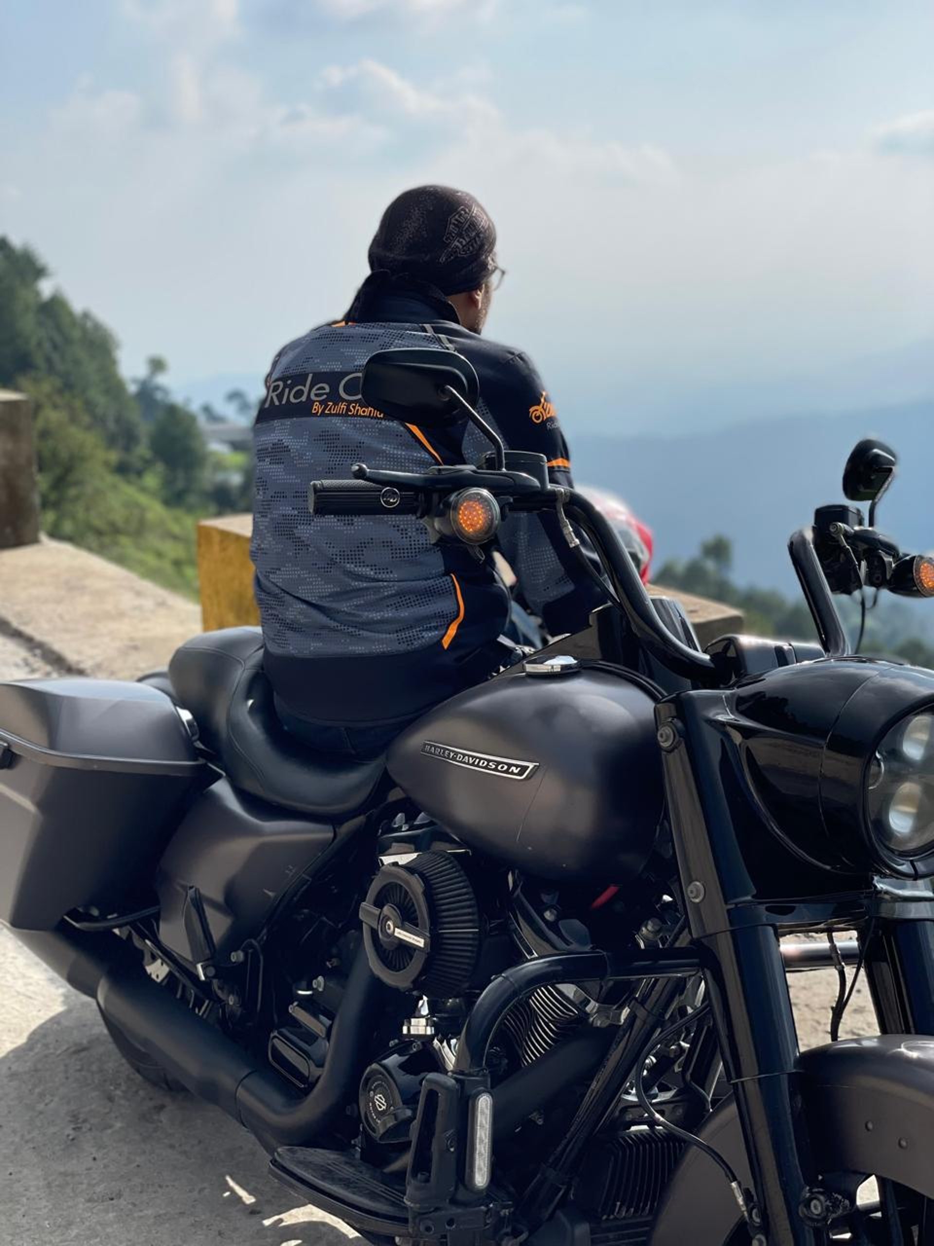 person wearing grey knit sweater