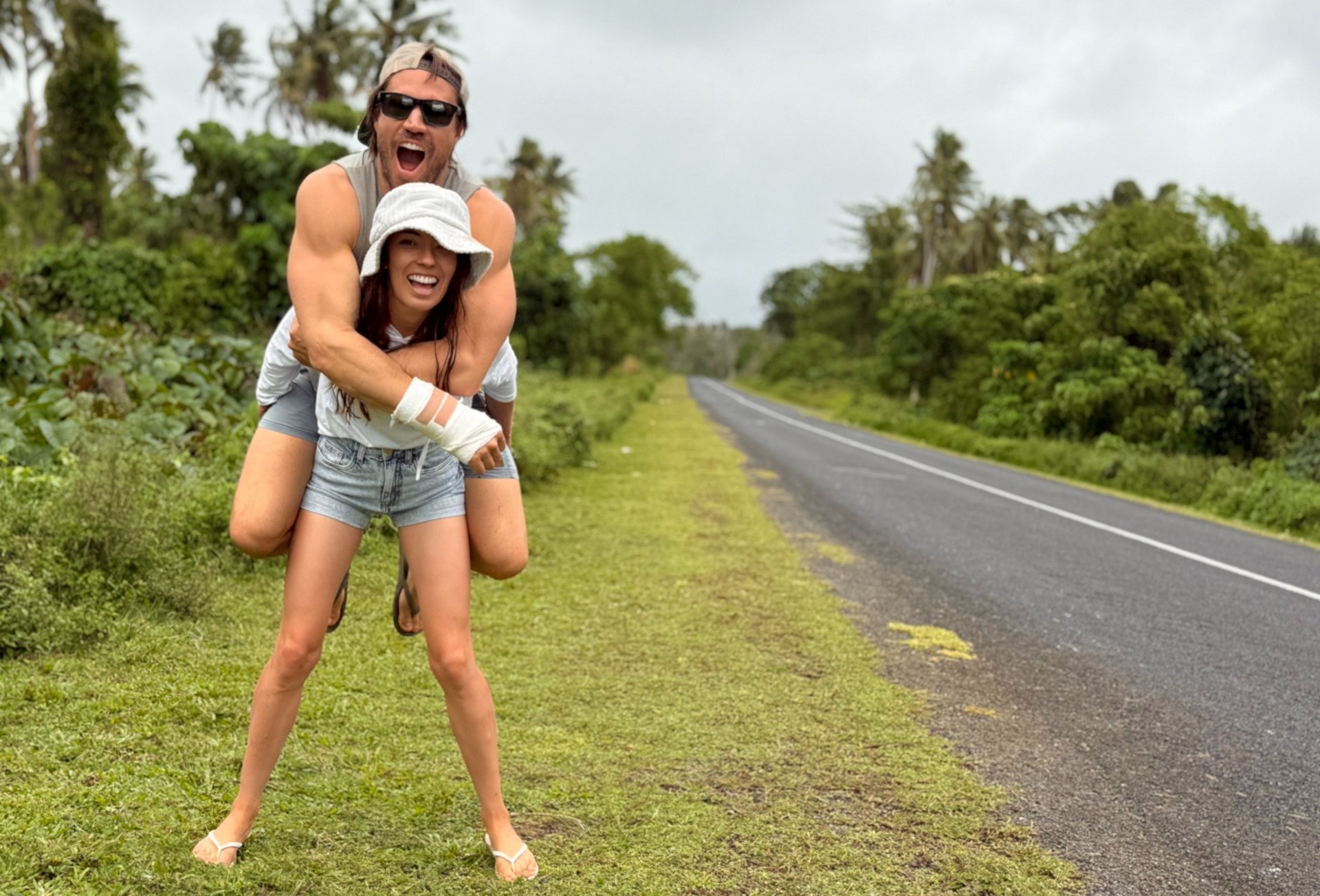 couple wearing silver-colored rings