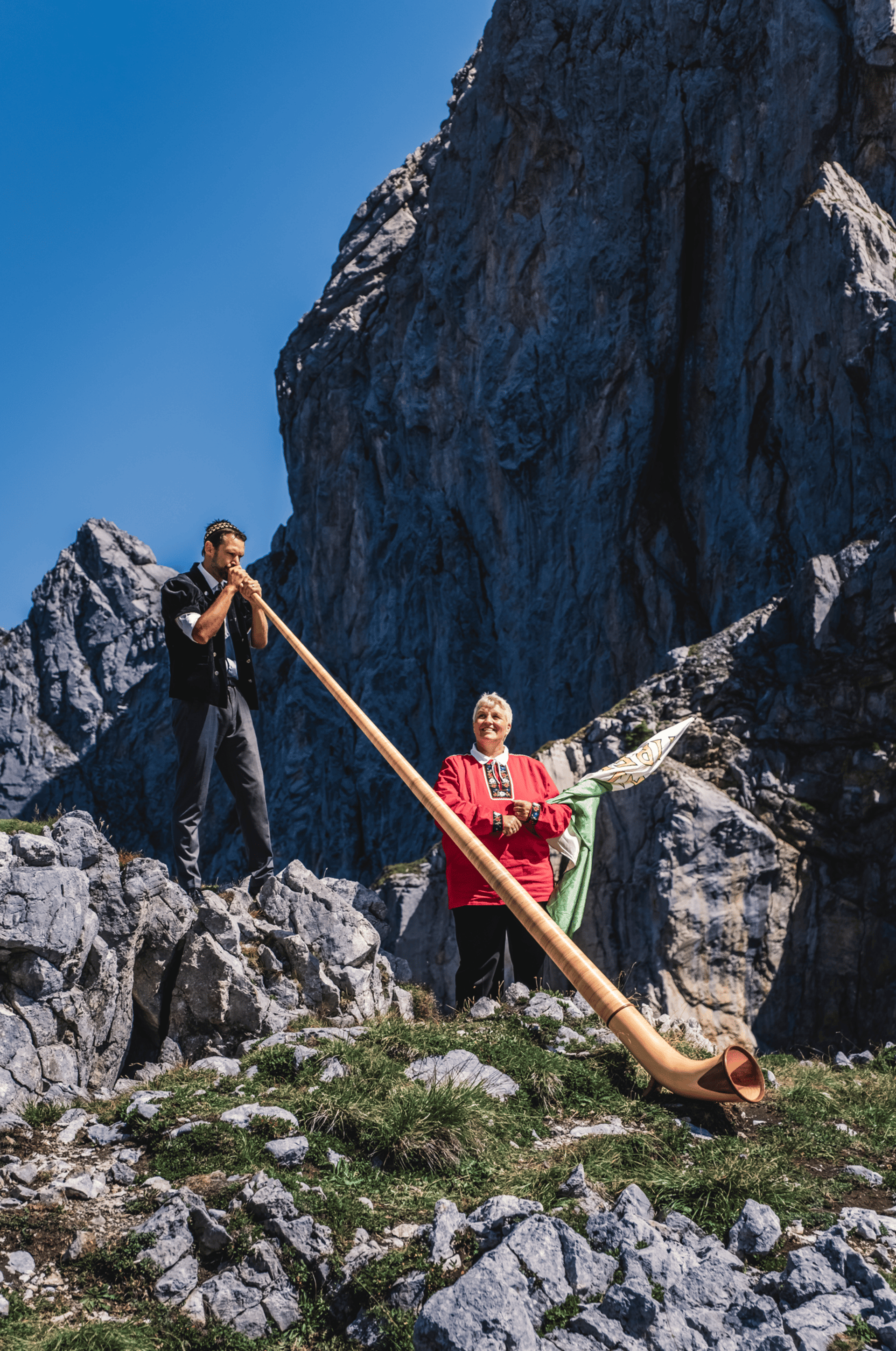 an abstract photo of a curved building with a blue sky in the background