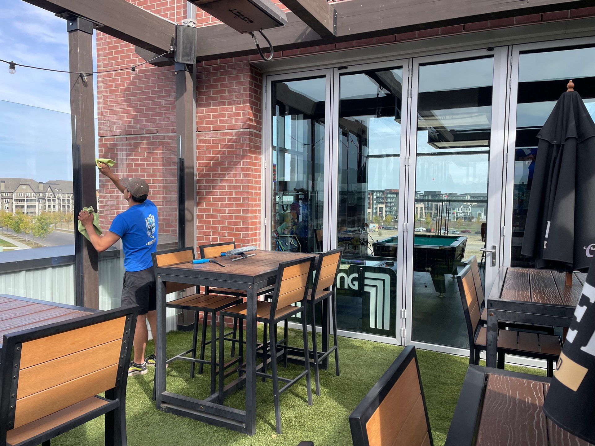 an abstract photo of a curved building with a blue sky in the background