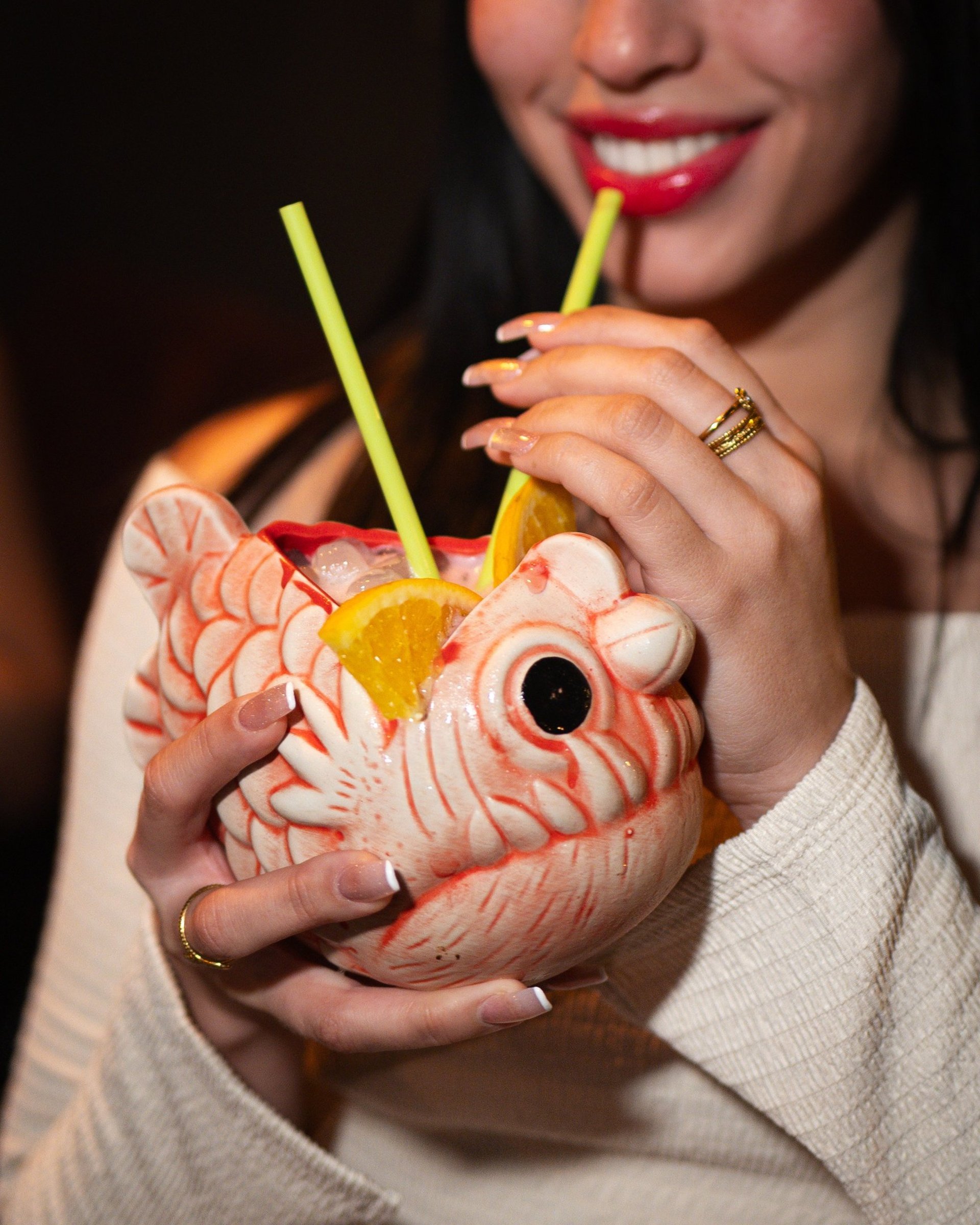 black and brown leather padded tub sofa