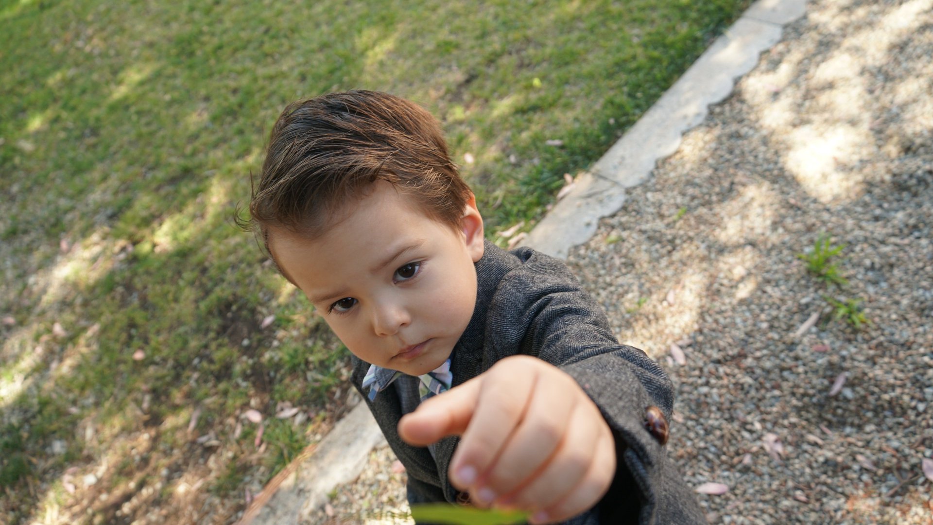 woman wearing yellow long-sleeved dress under white clouds and blue sky during daytime