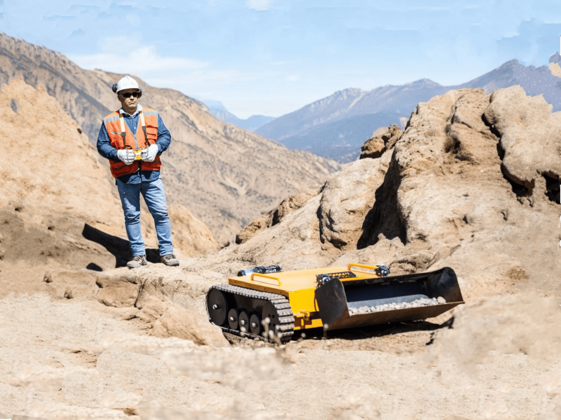 yellow heavy equipment on mountain