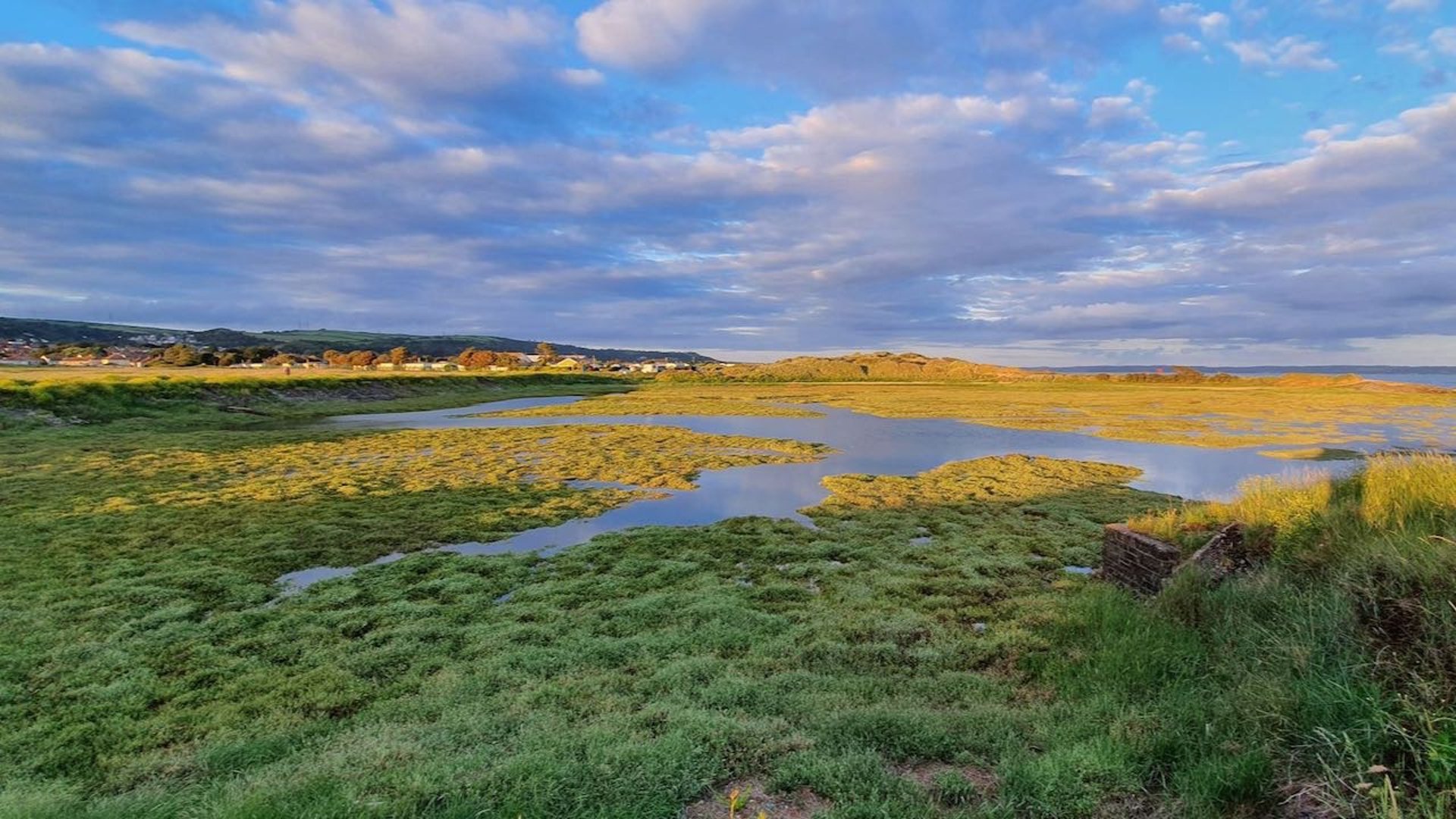 view of coastal path with dramatic sky