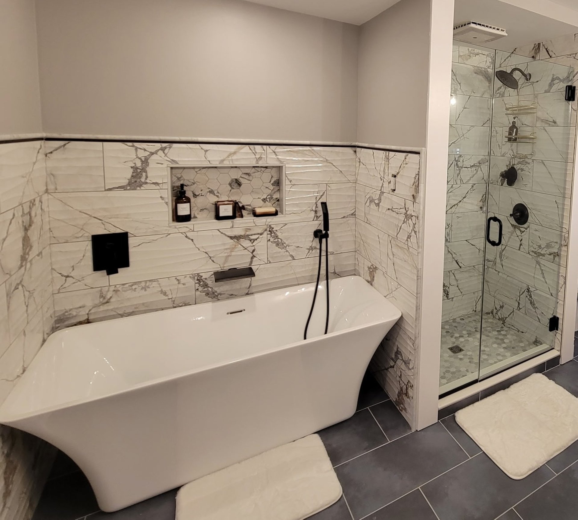 person using black laptop computer