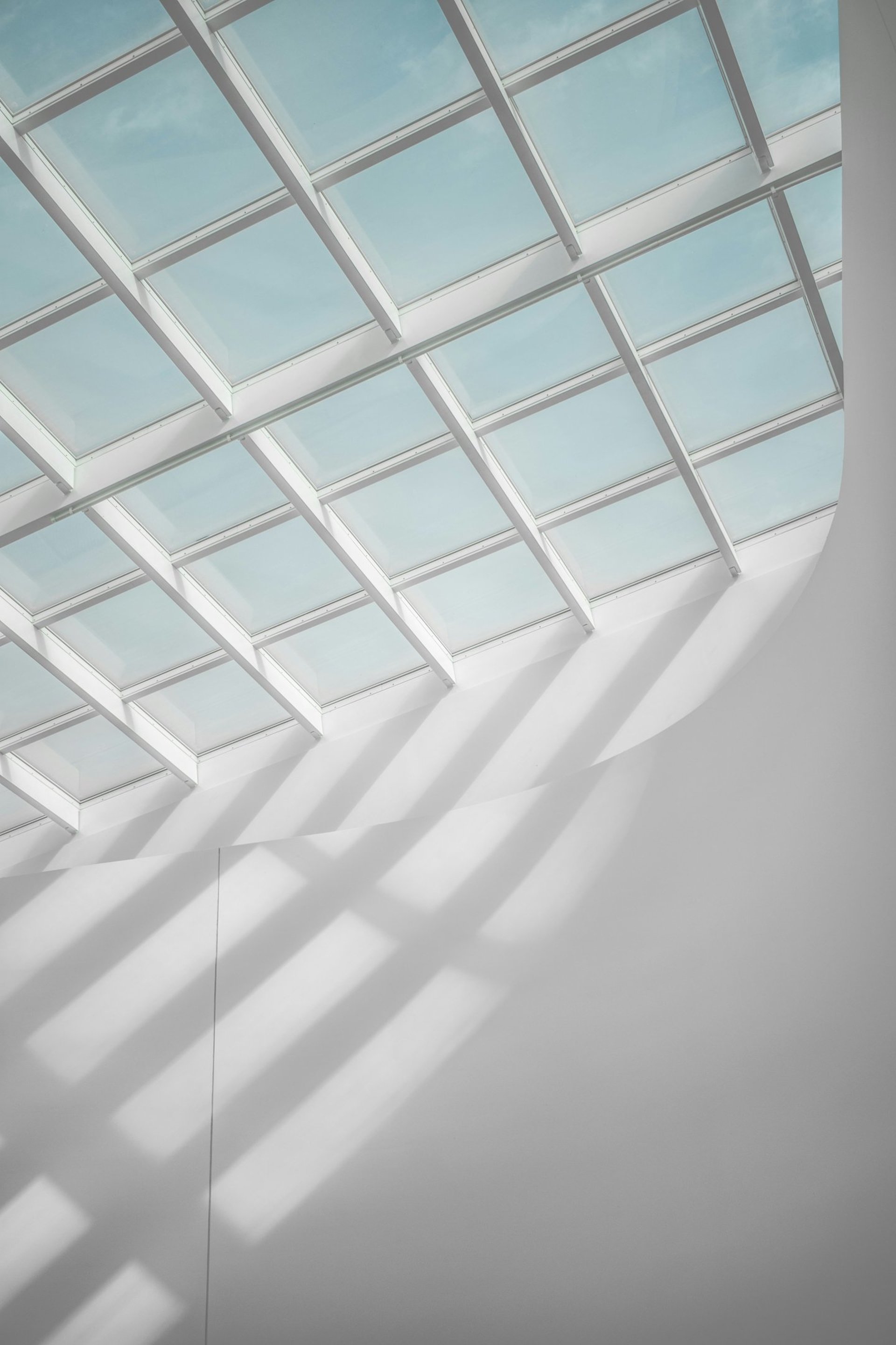 woman wearing yellow long-sleeved dress under white clouds and blue sky during daytime