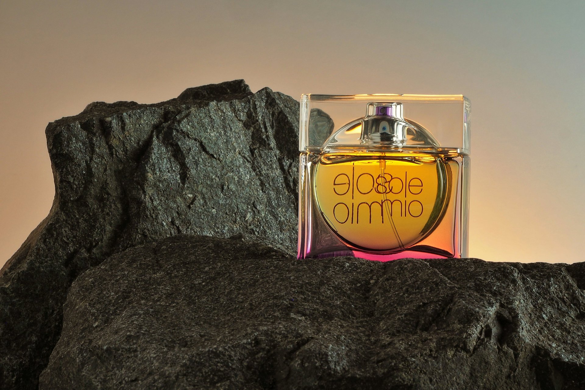 an abstract photo of a curved building with a blue sky in the background