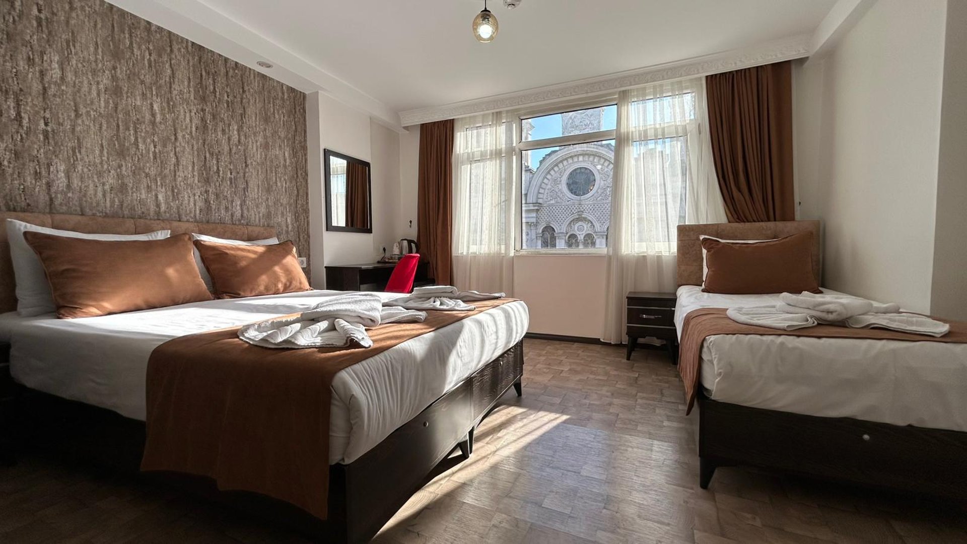 black and brown leather padded tub sofa