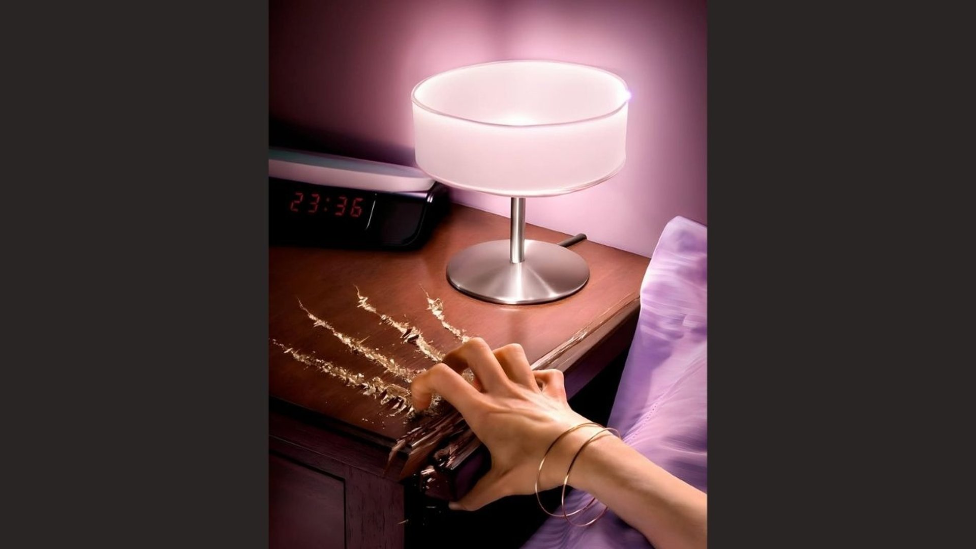 an abstract photo of a curved building with a blue sky in the background