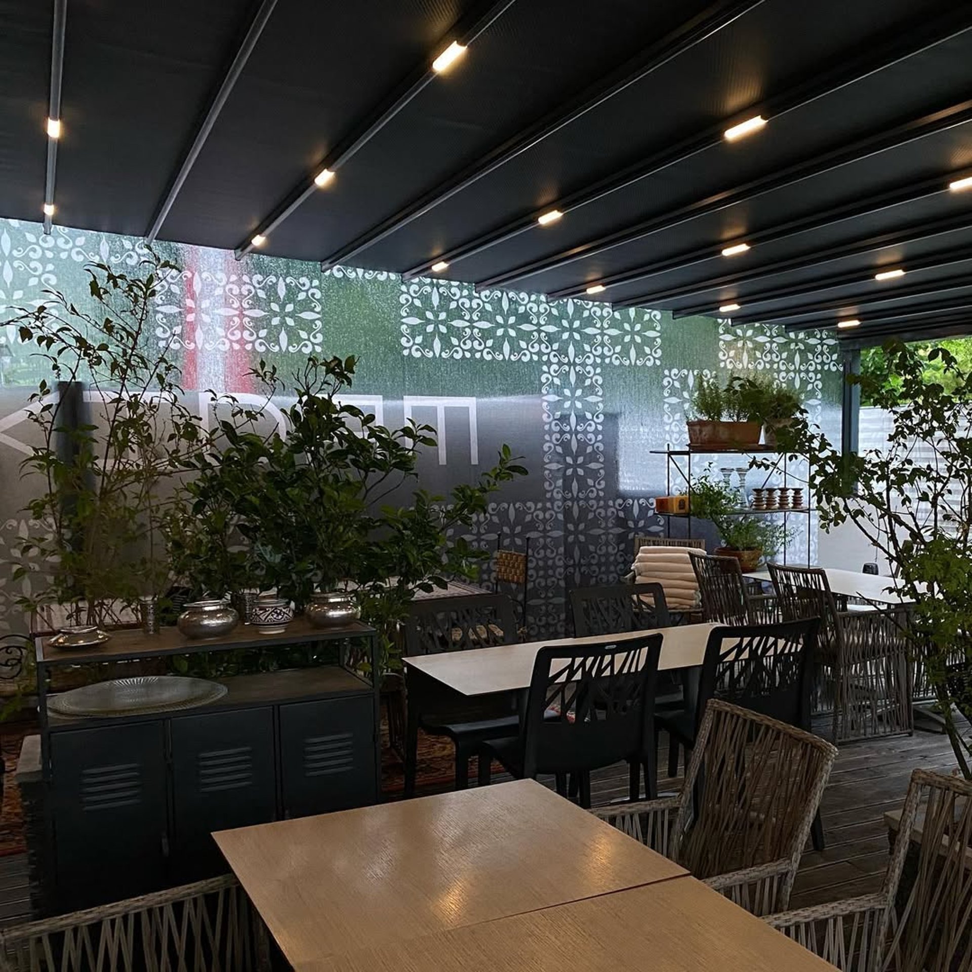 an abstract photo of a curved building with a blue sky in the background