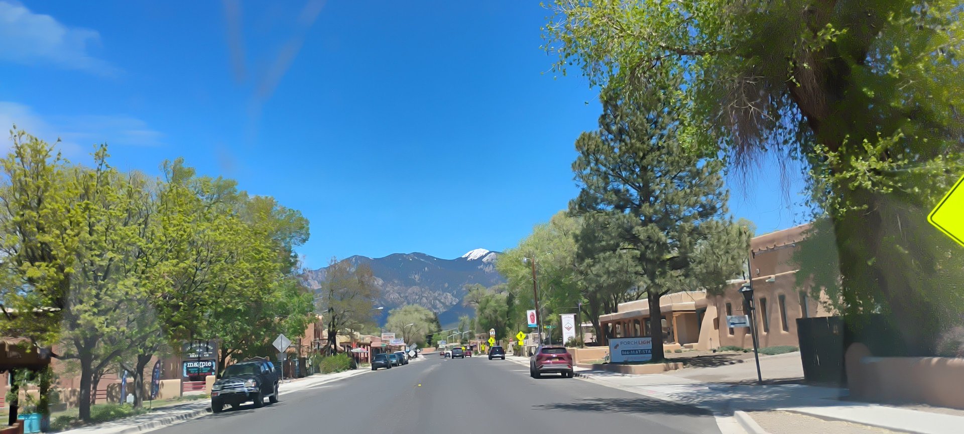 black and brown leather padded tub sofa