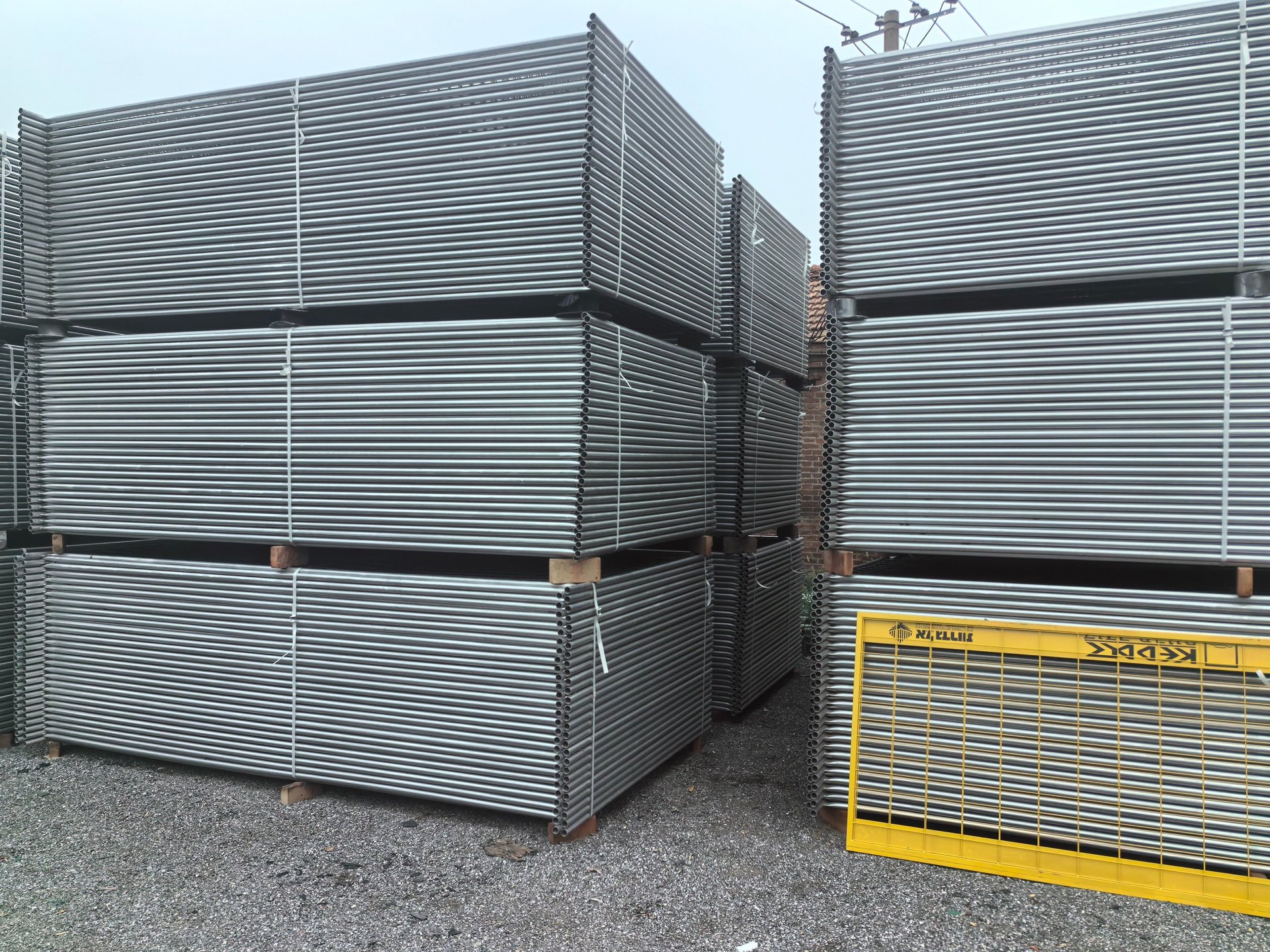 an abstract photo of a curved building with a blue sky in the background