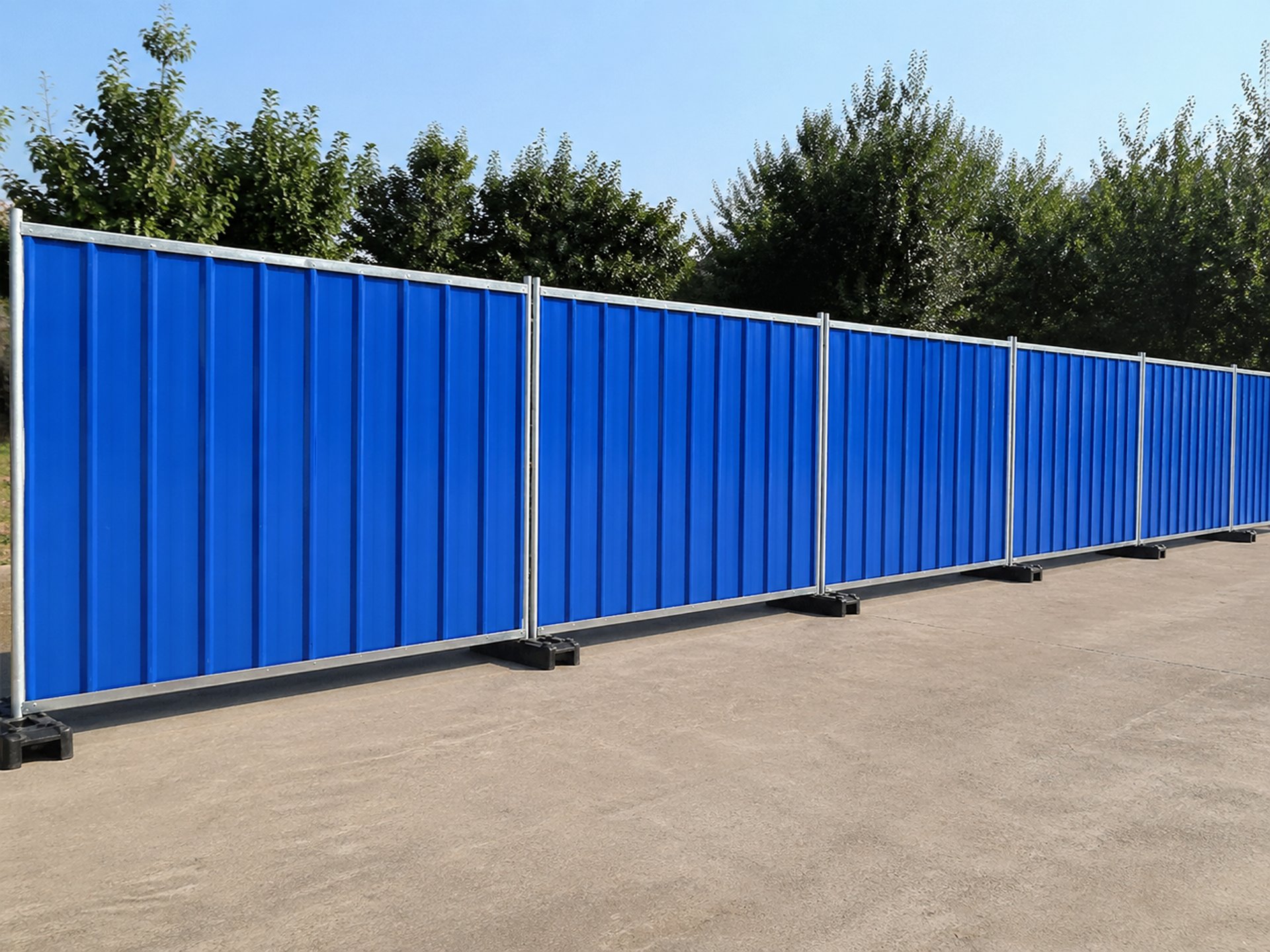an abstract photo of a curved building with a blue sky in the background