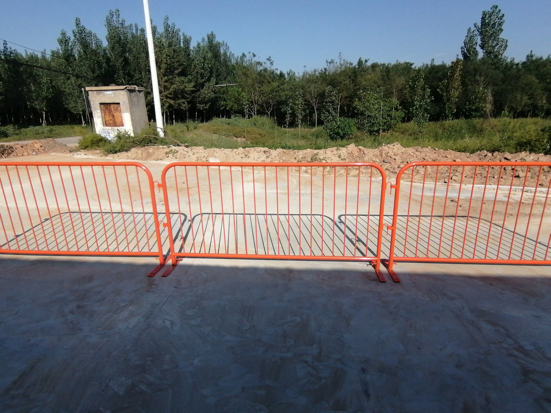 an abstract photo of a curved building with a blue sky in the background