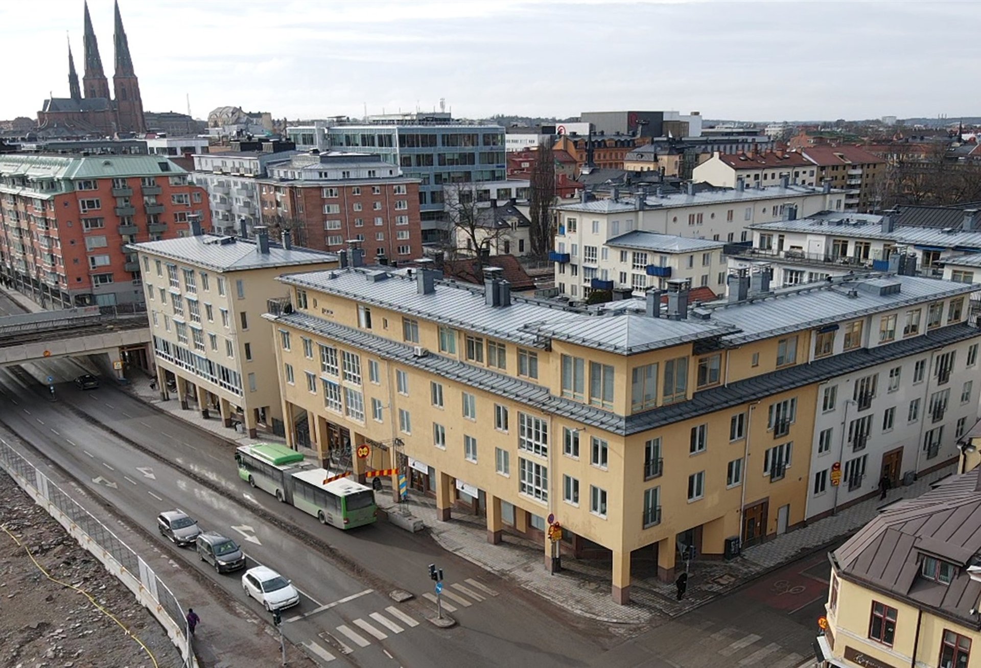 an abstract photo of a curved building with a blue sky in the background