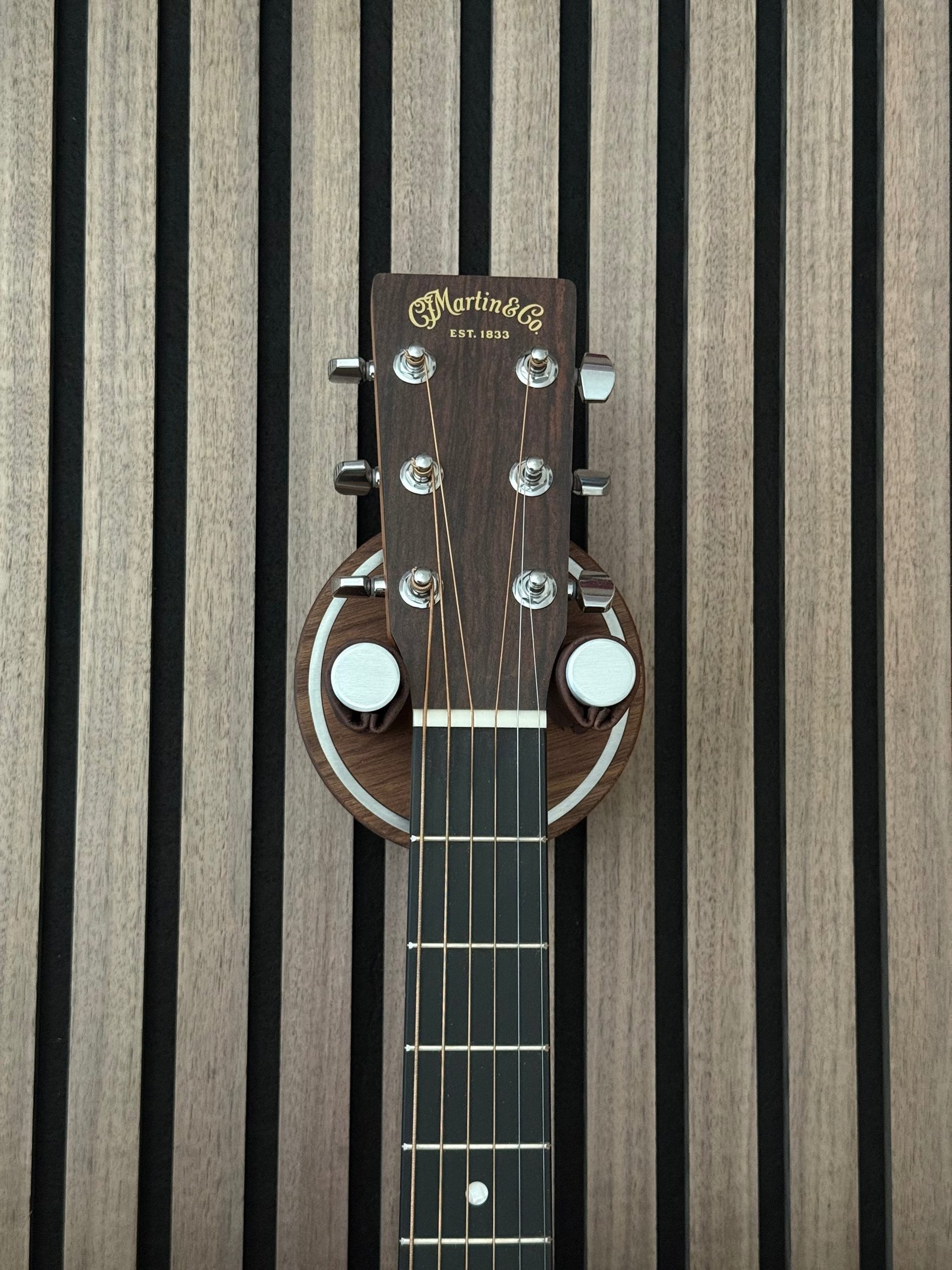 person wearing grey knit sweater