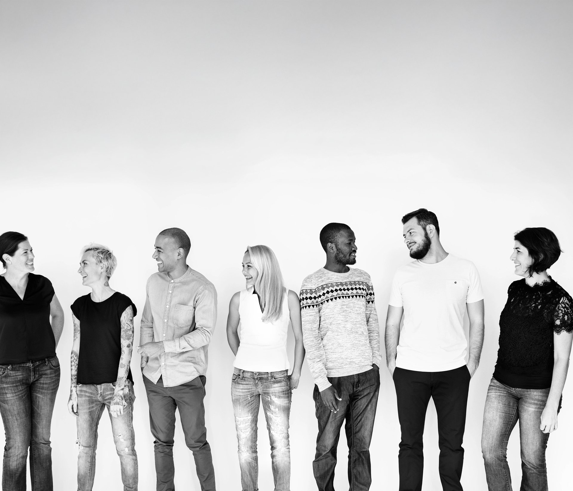woman wearing yellow long-sleeved dress under white clouds and blue sky during daytime