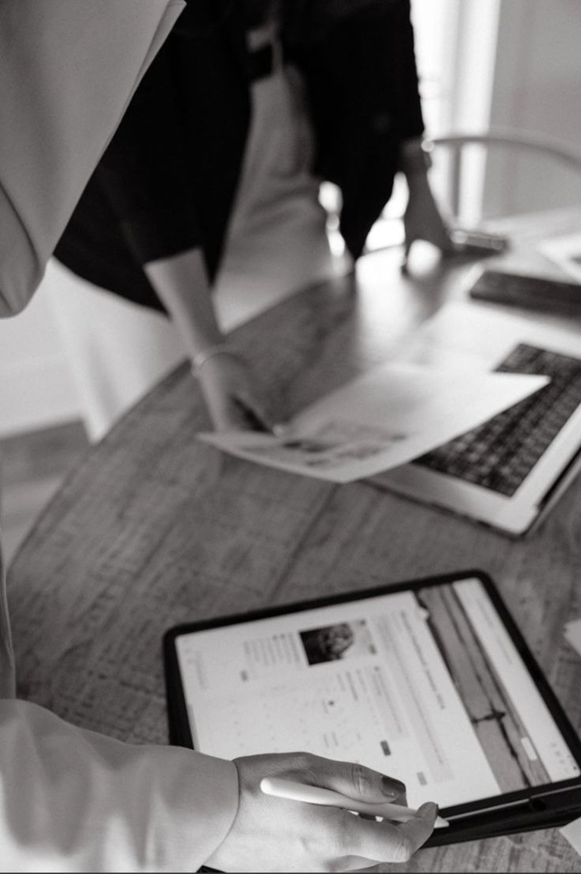an abstract photo of a curved building with a blue sky in the background