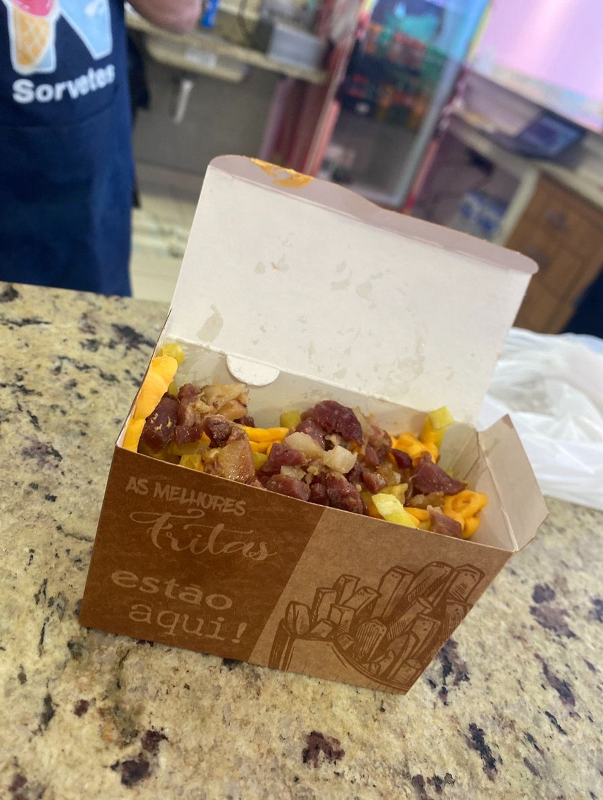 a slice of pizza being lifted from a plate