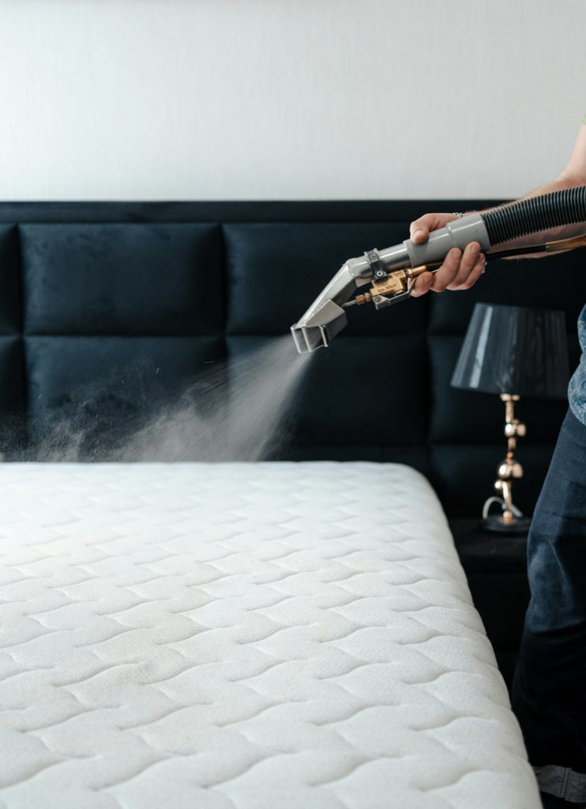 white bed pillow against white wall