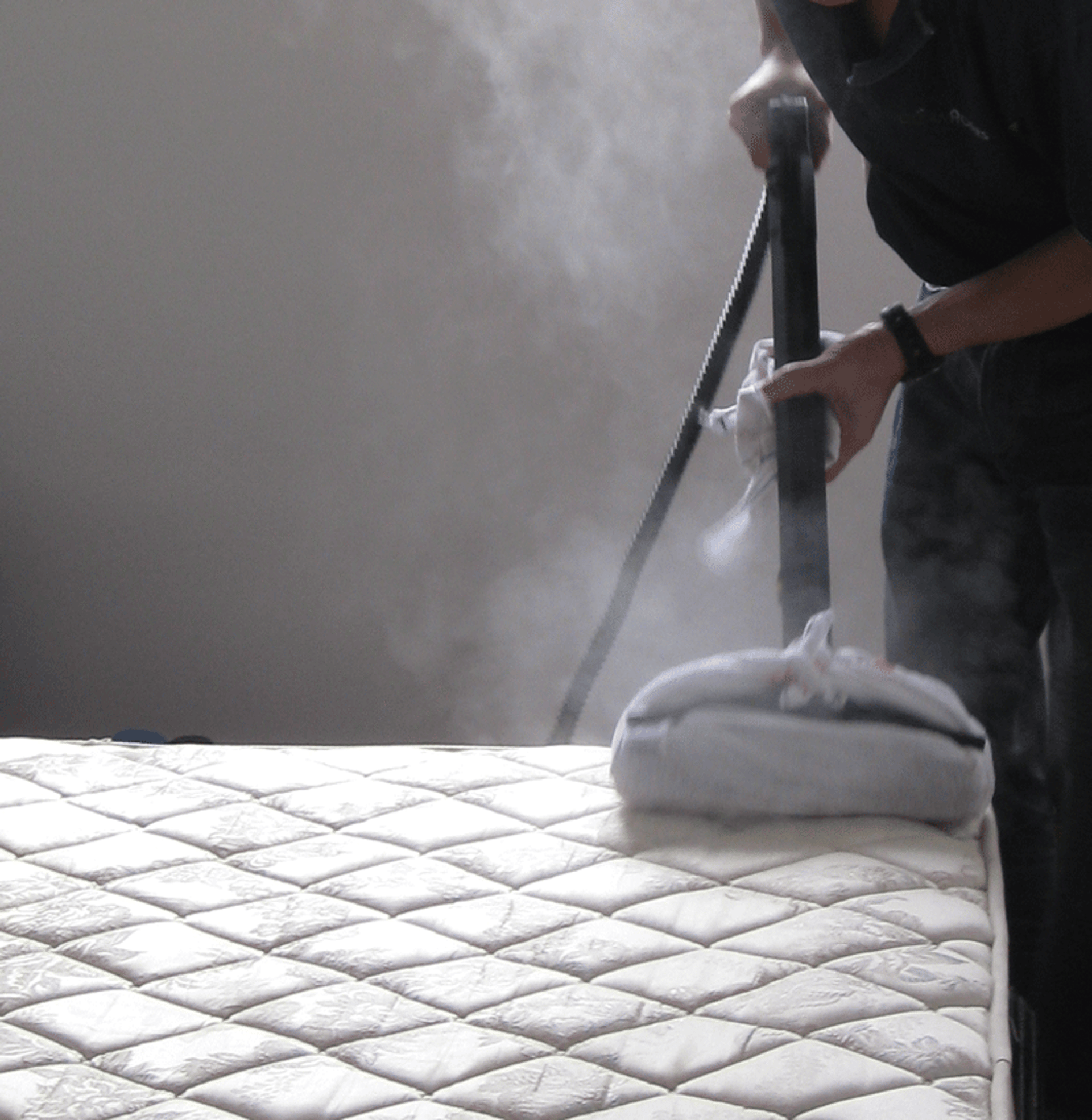 a close up of a mattress with a red label on it